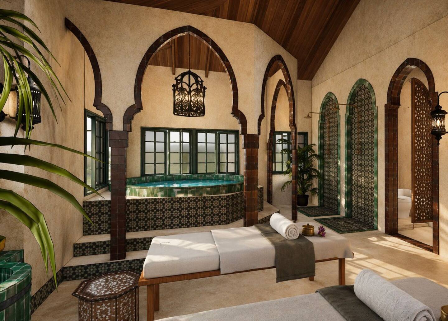 Private Moroccan inspired spa with side-by-side massage tables, carved arches and a fountain